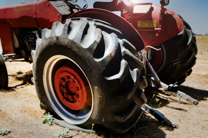 Tractor with a flat tire.