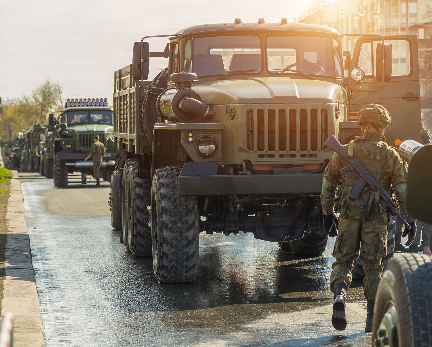 Caravan of military trucks.