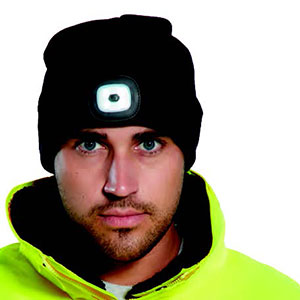 Image of a man wearing beanie with a LED light in front.