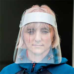 Image of a woman wearing a face shield.